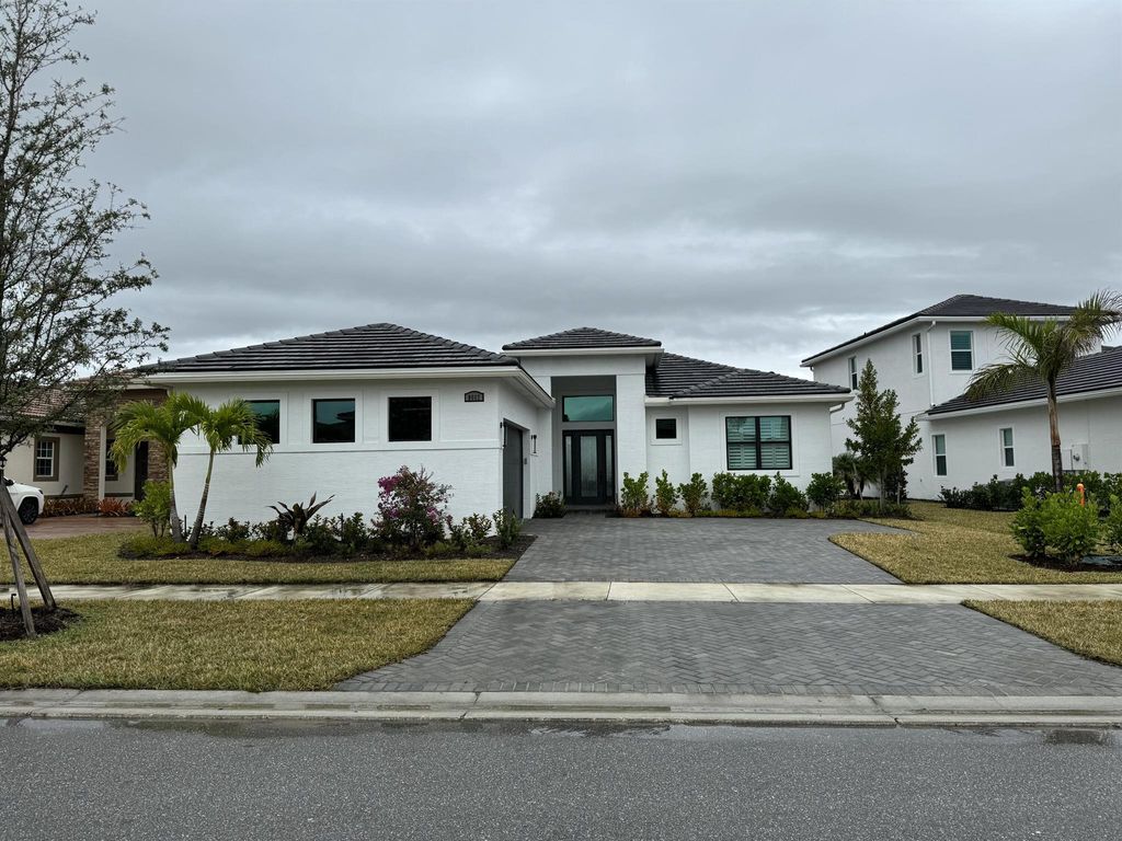 Photo of 8662 SW Felicita Way, Port St Lucie, FL 34987 (MLS # R10945248)