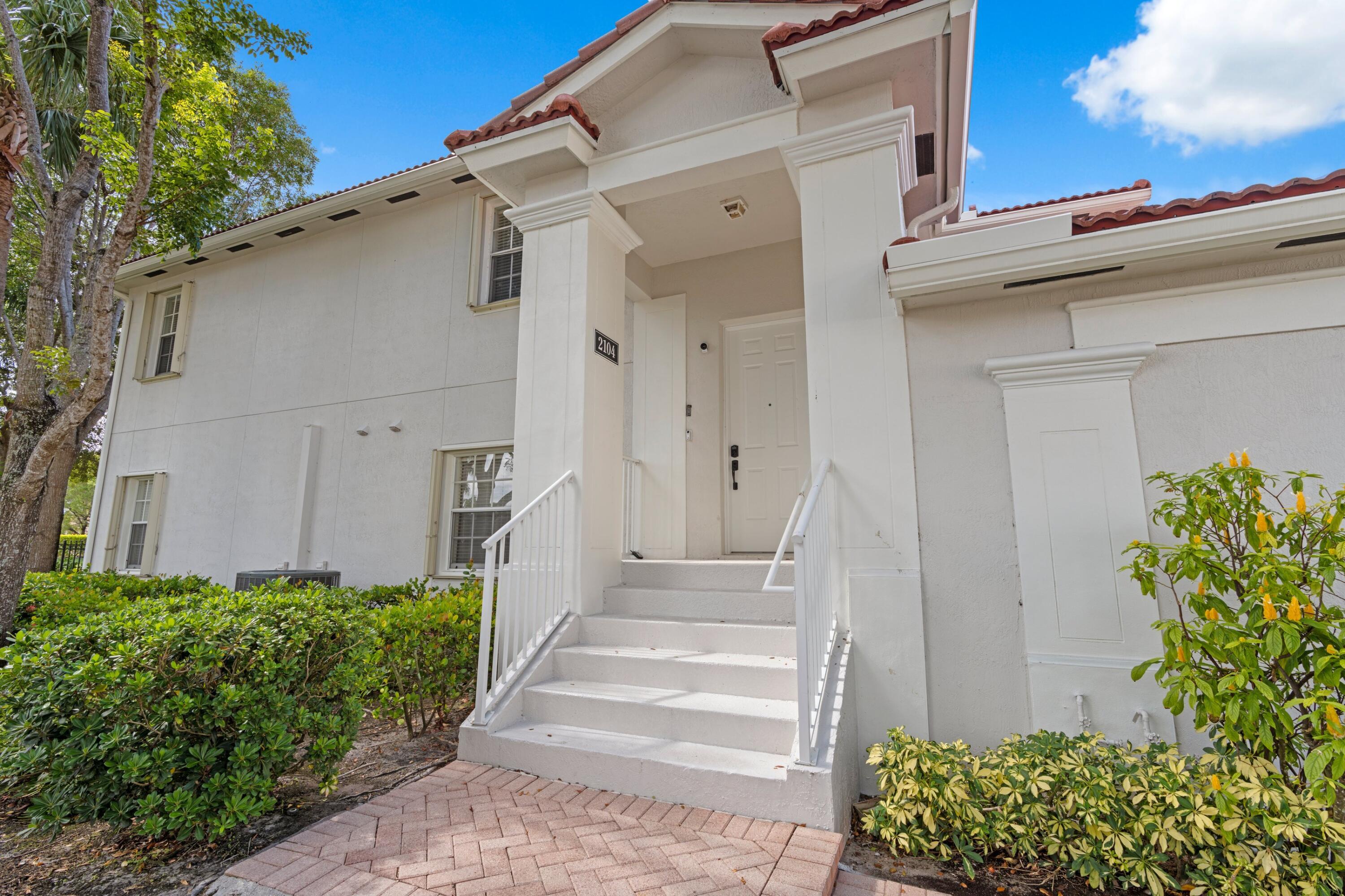 This bright and spacious corner-unit townhome offers 3 bedrooms, 2 full bathrooms, and a 2 car garage in the desirable 55+ Mayfair community of Wellington. Inside, you'll find a thoughtfully designed layout with a large living and dining area, tile flooring throughout the main living spaces, an updated kitchen with ample cabinetry, and a full-size washer and dryer. The primary suite includes a walk-in closet and an en-suite bath for added comfort.The Wellington Aquatics Complex directly borders the community, offering easy access to swimming, fitness, and recreational amenities. The Wellington Amphitheatre is also a minute away, providing a convenient venue for concerts, events, and markets. Lease terms range from 6 to 12 months, and up to 2 pets are welcome.