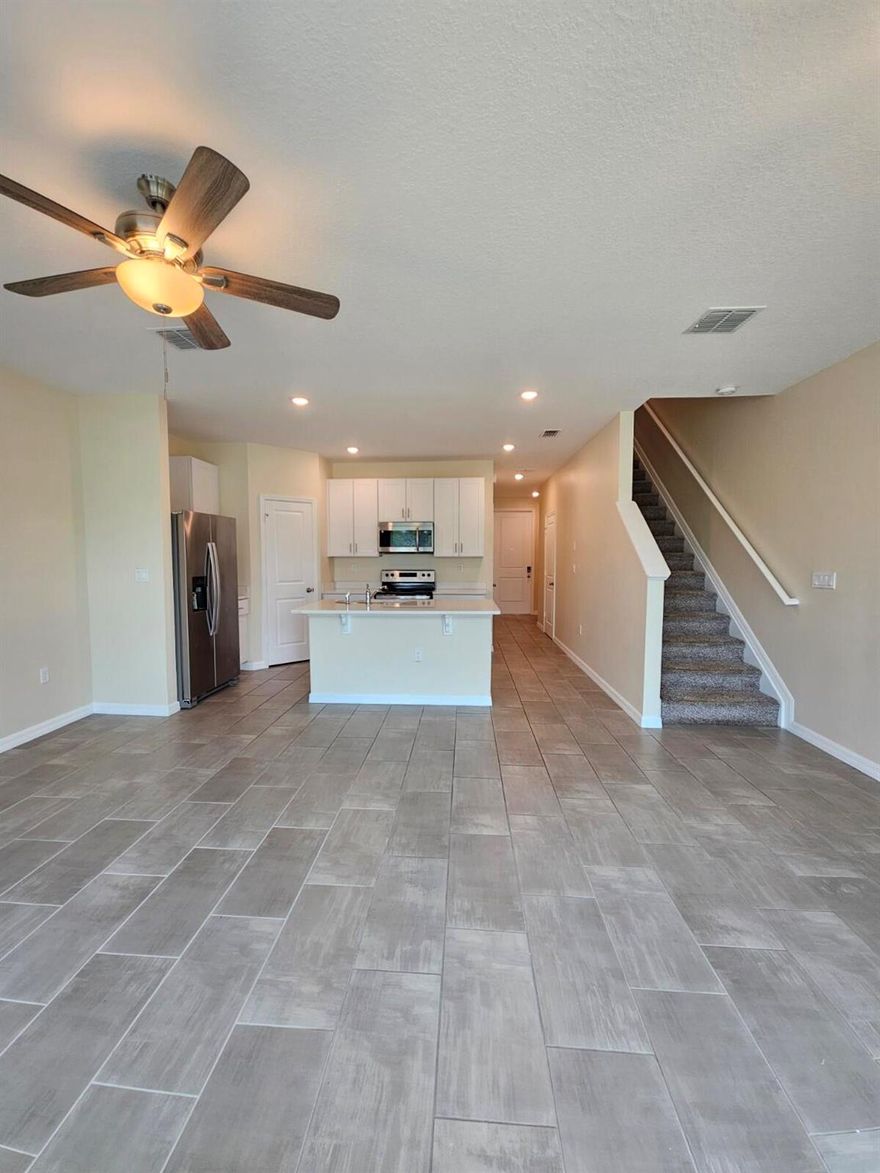 Modern 3-Bed, 2.5-Bath Townhouse in Prime Lake Worth Location!Built in 2022, this well-maintained two-story home offers stylish and comfortable living. The first floor features spacious living and dining areas, ceramic tile flooring, a convenient half bath, and a modern kitchen with stainless steel appliances. Upstairs, you'll find all three bedrooms, a generous loft space, and freshly cleaned carpet. The entire home has been freshly painted in soft, elegant tones, with decorative ceiling fans in the living room and bedrooms. Ideally located near I-95, major roadways, and plenty of shopping and dining options!