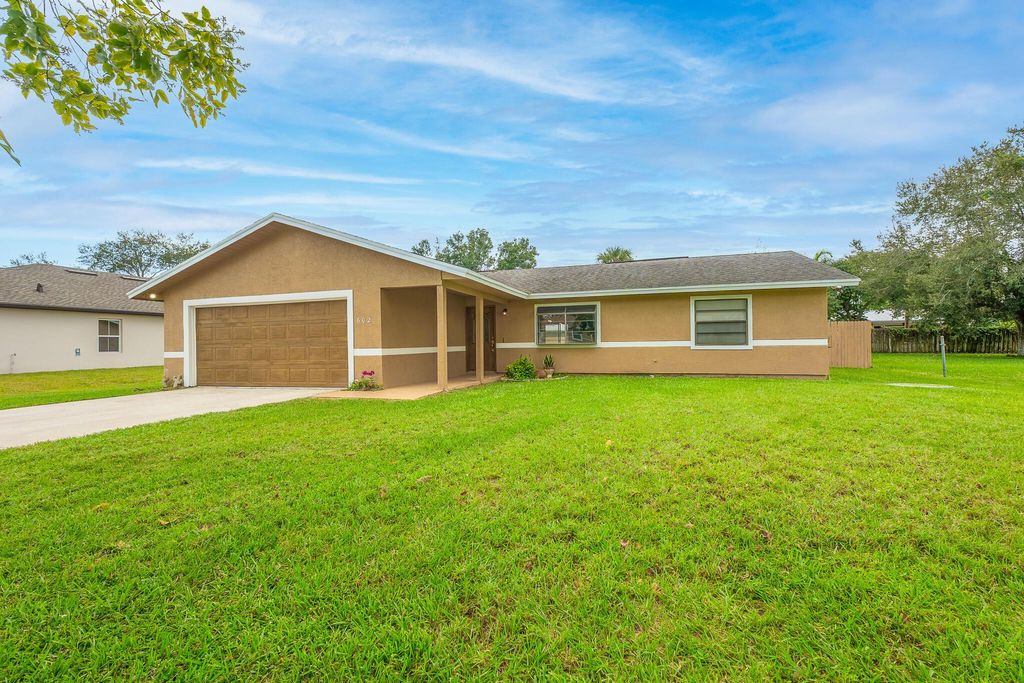 Photo of 602 NW Archer Avenue, Port Saint Lucie, FL 34983 (MLS # R11134804)