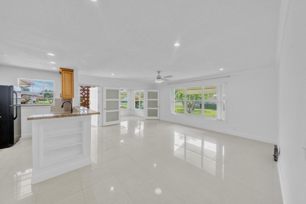 Photo of 1360 SE High Point Way SE #A, Delray Beach, FL 33445 (MLS # B26084644)