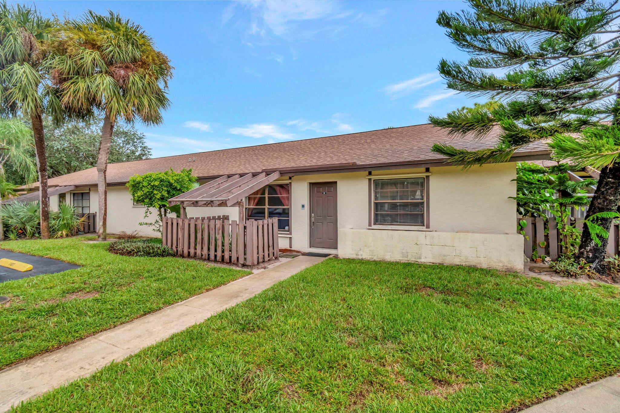 Brand New Roof!! Welcome to this charming, rarely available 3-Bedroom, 2-Bathroom Villa in a Vibrant Gated Community! Super close to pool and community center! Offering bright and spacious living in an all-age community. This meticulously maintained home is move-in ready, providing a cozy and inviting retreat you'll love calling home.The villa features stunning vaulted wood ceilings that add a touch of rustic elegance, creating a warm and welcoming atmosphere. With a brand-new roof recently installed, you can enjoy peace of mind knowing this home has been well cared for.Located in a gated community, you'll have access to a range of fantastic amenities, including pickleball and basketball courts, and a refreshing pool - perfect for enjoying Florida's sunny weather.