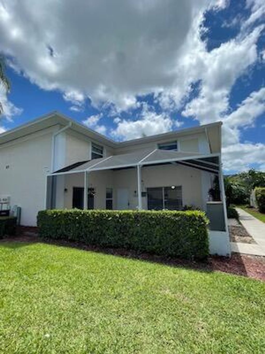 Photo of 1542 N Lawnwood Circle #37, Fort Pierce, FL 34950 (MLS # R10893051)