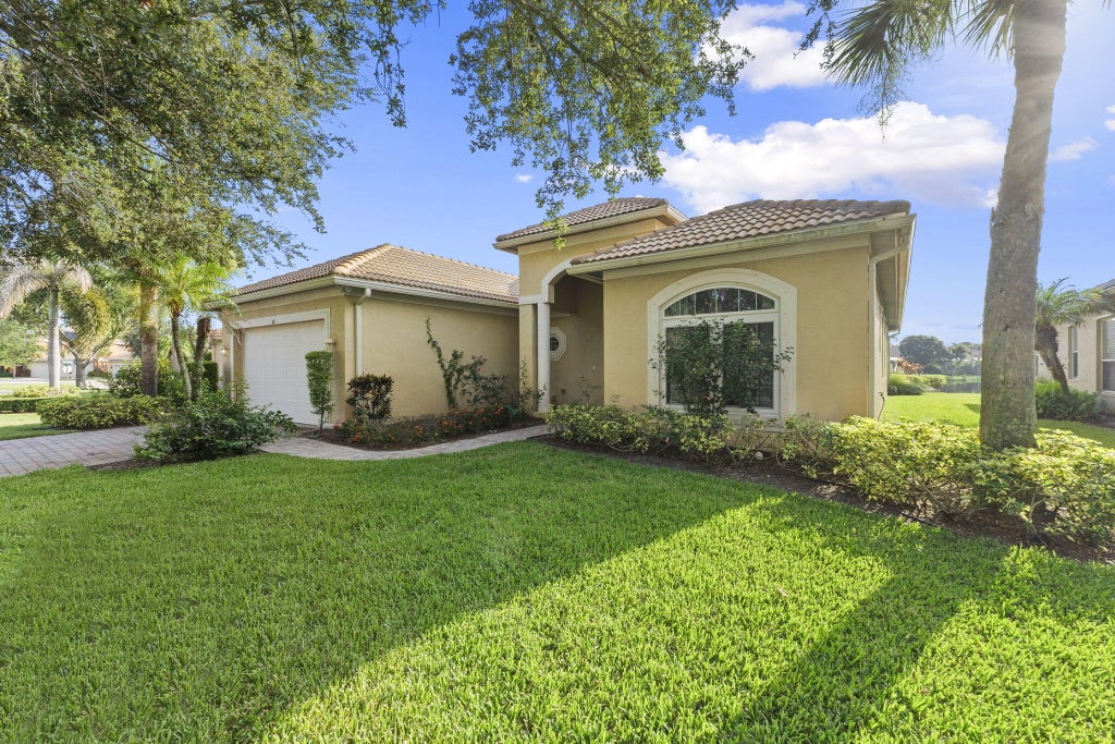 Photo of 411 NW Sheffield Circle, Port Saint Lucie, FL 34983 (MLS # B26057935)