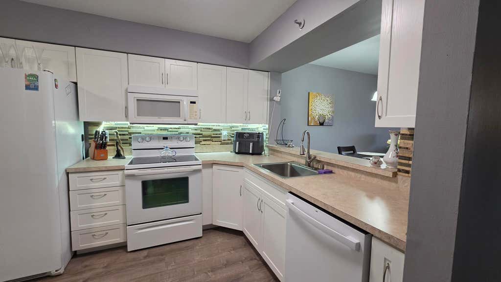 Photo of 2206 S CYPRESS BEND Drive #504, Pompano Beach, FL 33069 (MLS # B26069066)