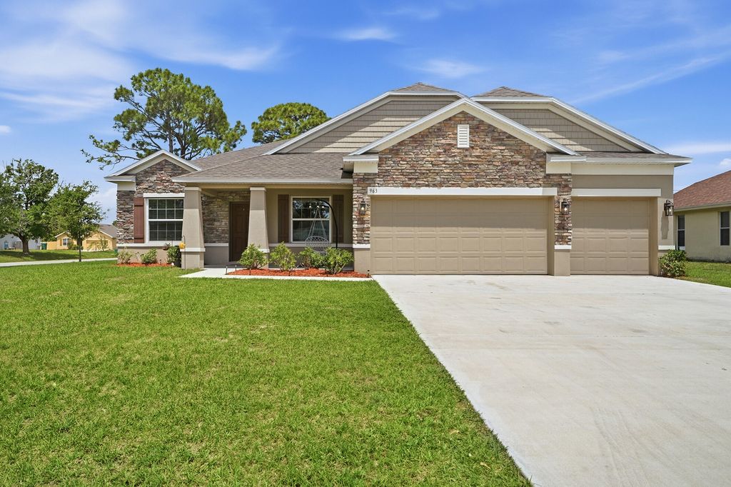 Photo of 963 SW Cecil Lane, Port Saint Lucie, FL 34953 (MLS # B26016274)