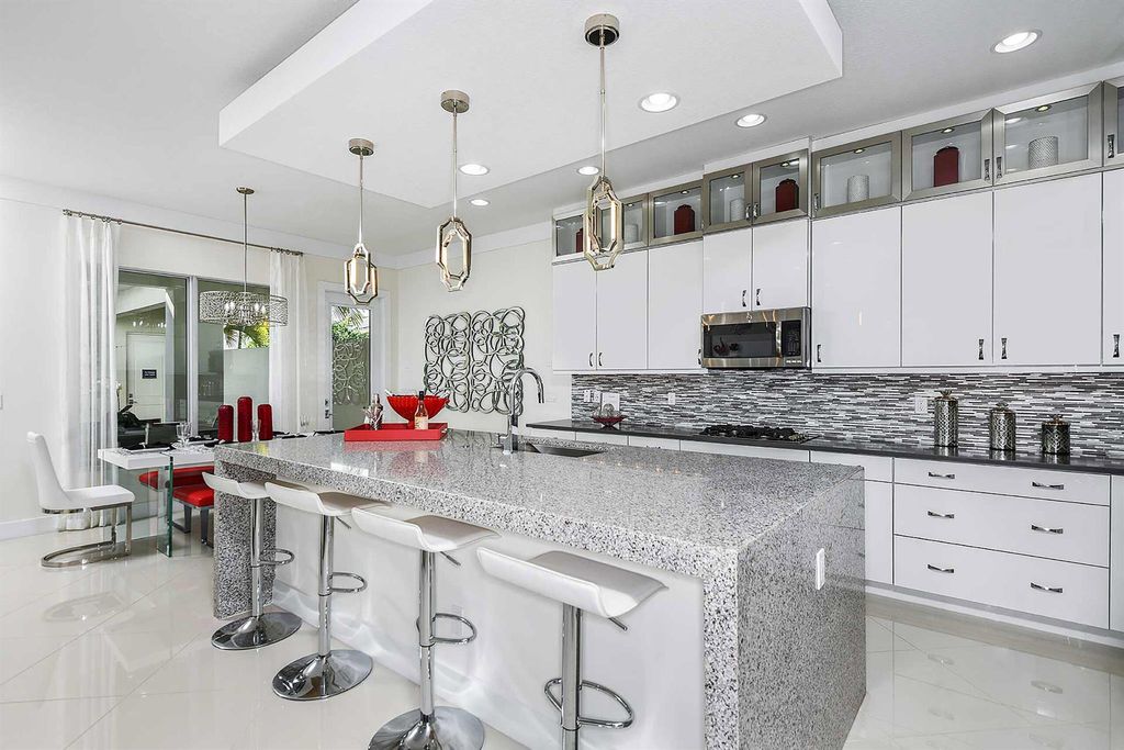 Photo of 1022 Faulkner Terrace, Palm Beach Gardens, FL 33418 (MLS # R10902528)