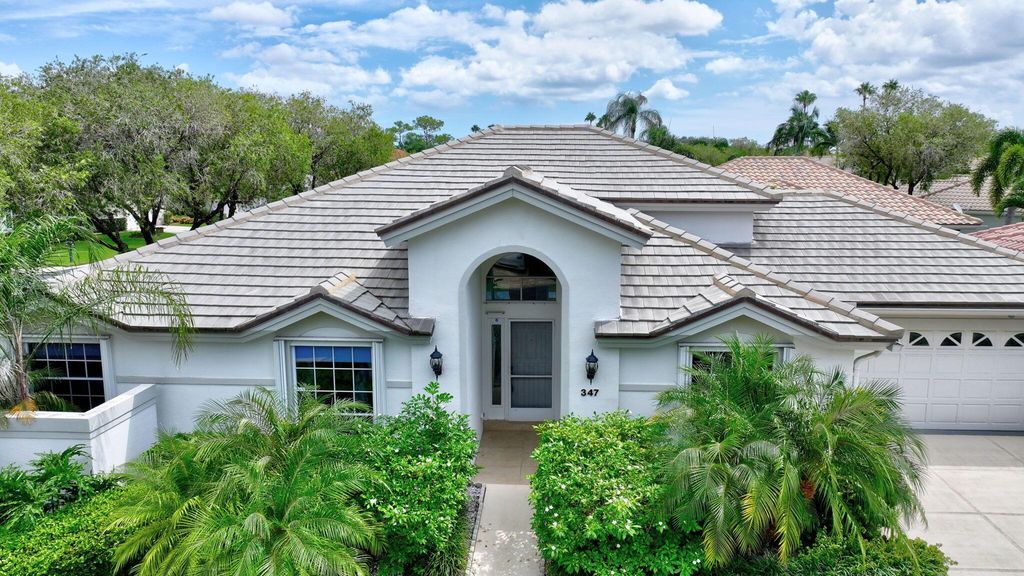 Photo of 347 Eagleton Golf Drive, Palm Beach Gardens, FL 33418 (MLS # R11018486)