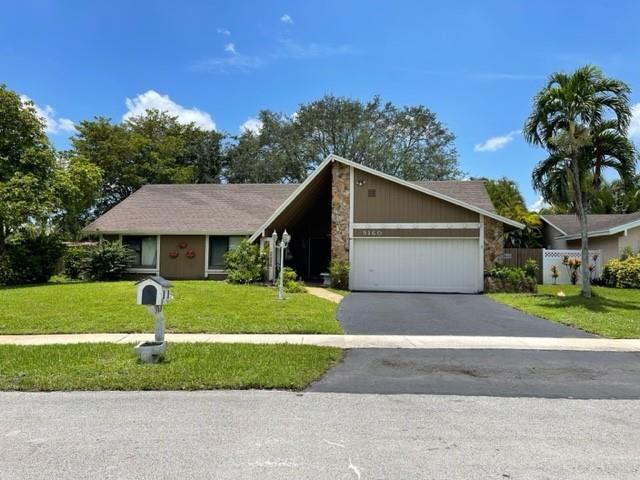 Beautiful 3/2 single-family home in the beautiful Jacaranda Lakes community. has been freshly painted with interior upgrades as well. Tile throughout the main living areas and there is a playroom, too! Spacious living and dining area perfect for relaxing. This home also has a screened-in patio that looks out. This property is in a prime location, with easy access to A-rated schools, and retailing-restaurant plazas.