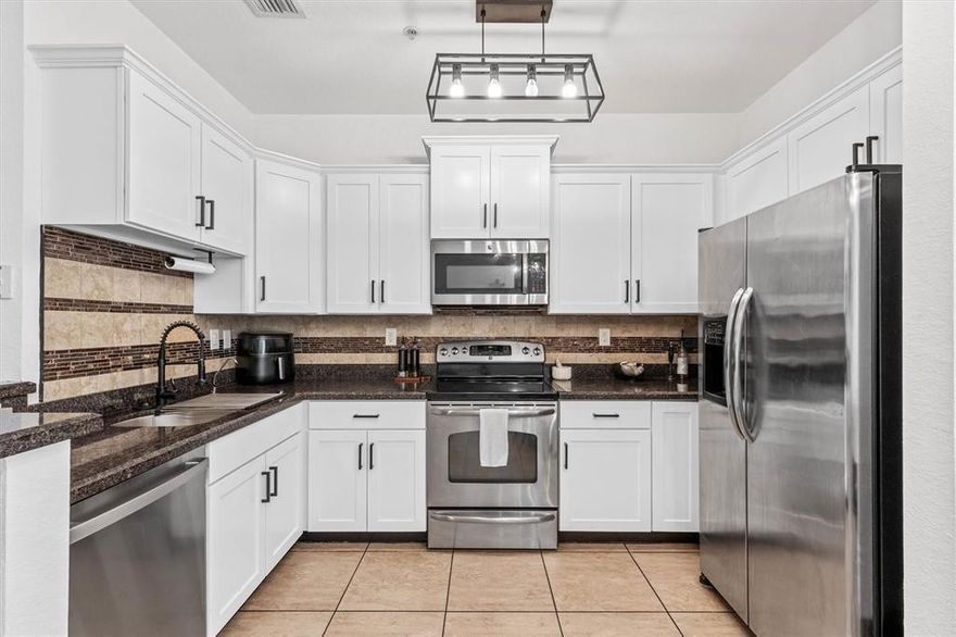 Corner unit 3-bed, 2.5-bath townhome in a gated, pet-friendly community. Main level offers open living and dining that flow into a contemporary kitchen with stainless steel appliances, plus a spacious attached garage. Upstairs are three bedrooms: two share a full hall bath, and the primary suite features a walk-in closet and spa-style bath. Community perks include a sparkling pool, fitness center, and roving security. Internet and cable included in HOA. Minutes to major highways and neighborhood supermarkets. Move-in ready and easy to show.