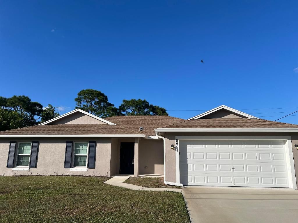 Photo of 5951 NW Baynard Drive, Port Saint Lucie, FL 34986 (MLS # R11142649)