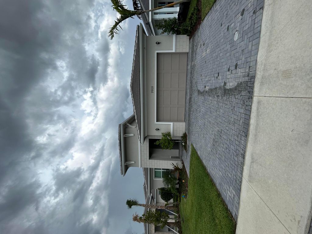 Photo of 9908 Timber Creek Way, Palm Beach Gardens, FL 33412 (MLS # B26009683)