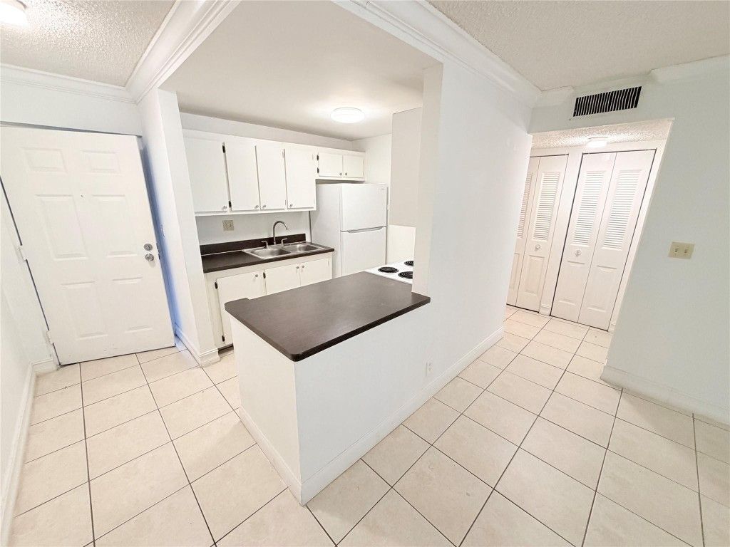 Photo of 1850 N Congress Avenue #106, West Palm Beach, FL 33401 (MLS # F10544364)