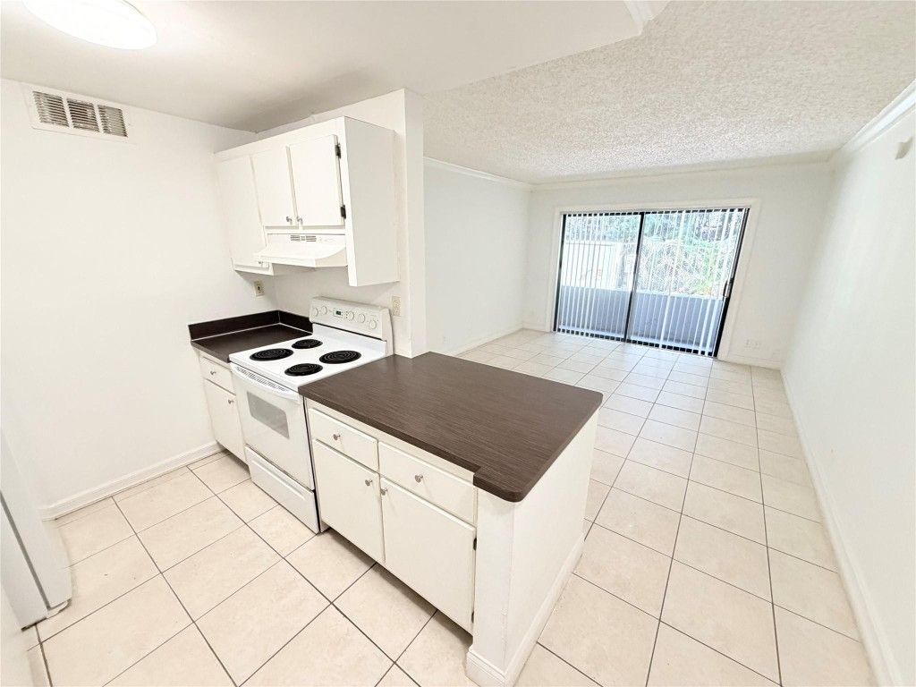 Photo of 1850 N Congress Avenue #106, West Palm Beach, FL 33401 (MLS # F10544364)