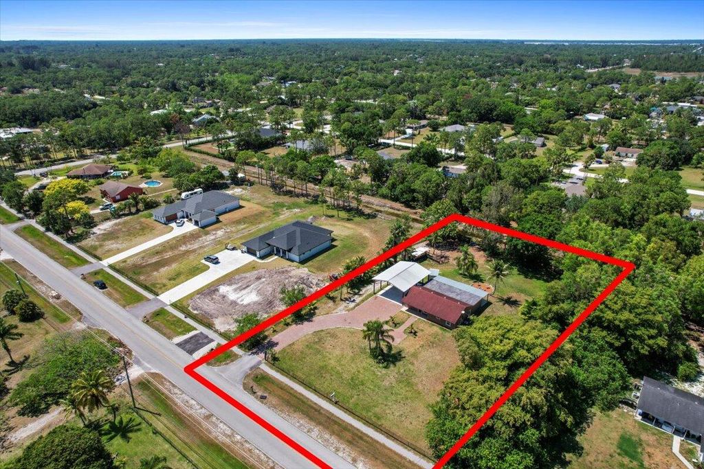 Photo of 11819 Tangerine Boulevard, West Palm Beach, FL 33412 (MLS # R10986104)