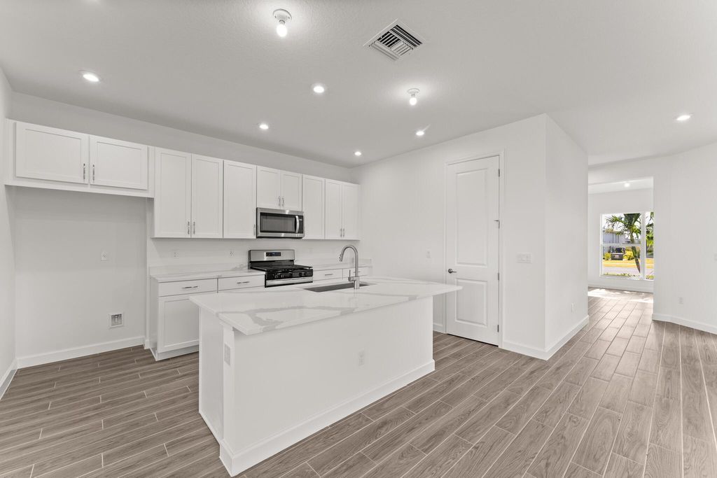 Photo of 13478 SW Bally Drive, Port Saint Lucie, FL 34987 (MLS # R11090310)