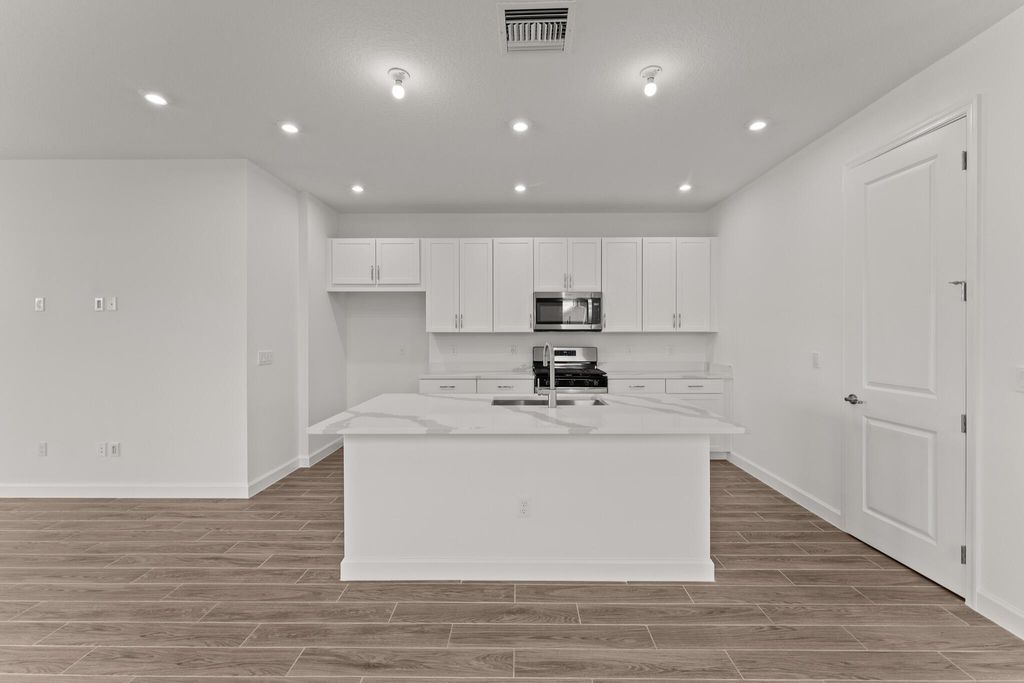 Photo of 13478 SW Bally Drive, Port Saint Lucie, FL 34987 (MLS # R11090310)