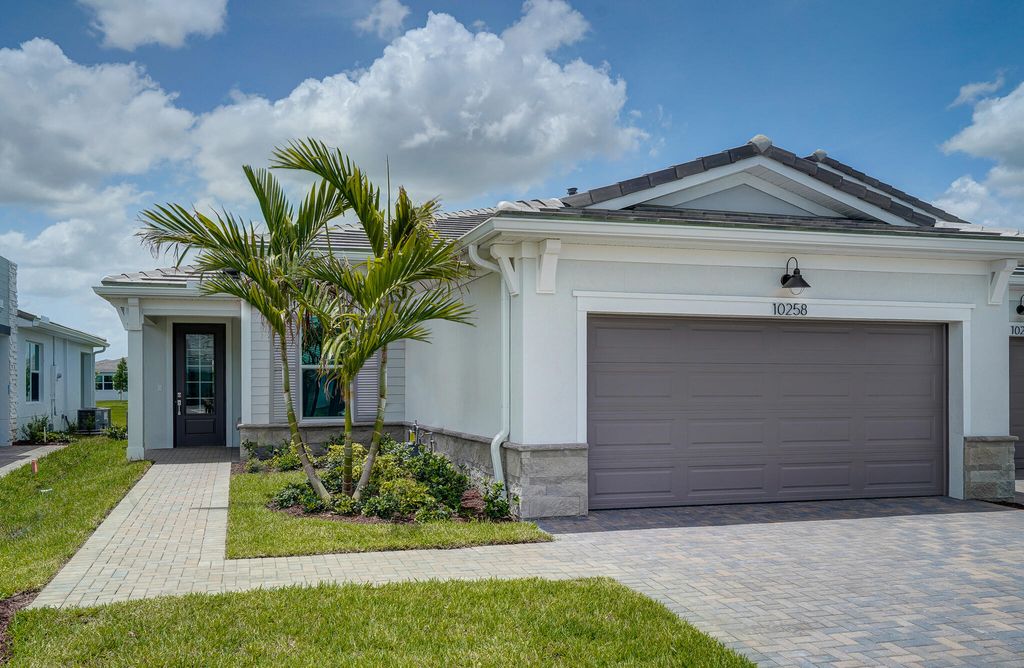 Photo of 10258 SW Corvus Lane Ln, Port Saint Lucie, FL 34987 (MLS # R10809109)