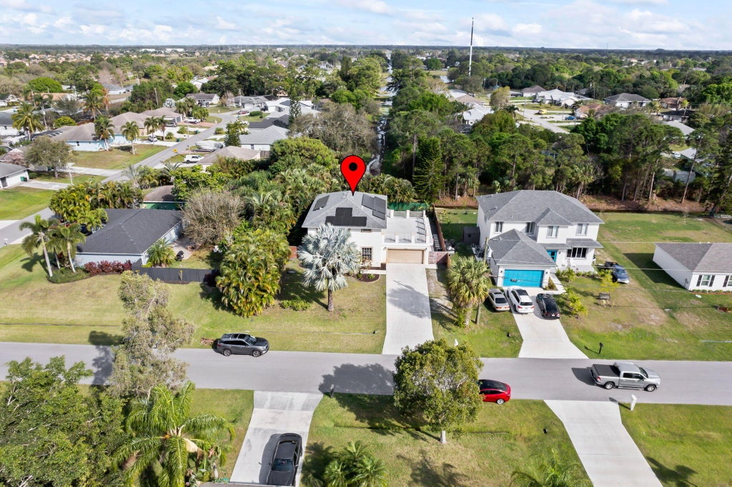 Photo of 1617 SW Davis Street, Port Saint Lucie, FL 34953 (MLS # R11062539)