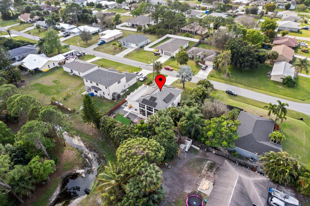Photo of 1617 SW Davis Street, Port Saint Lucie, FL 34953 (MLS # R11062539)
