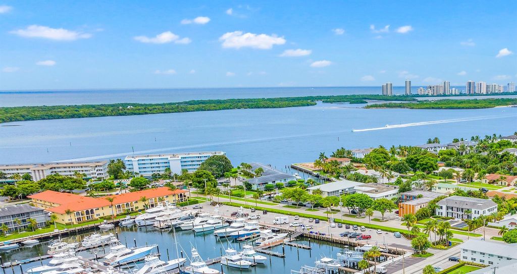 Photo of 52 Yacht Club Drive #105, North Palm Beach, FL 33408 (MLS # R11102744)