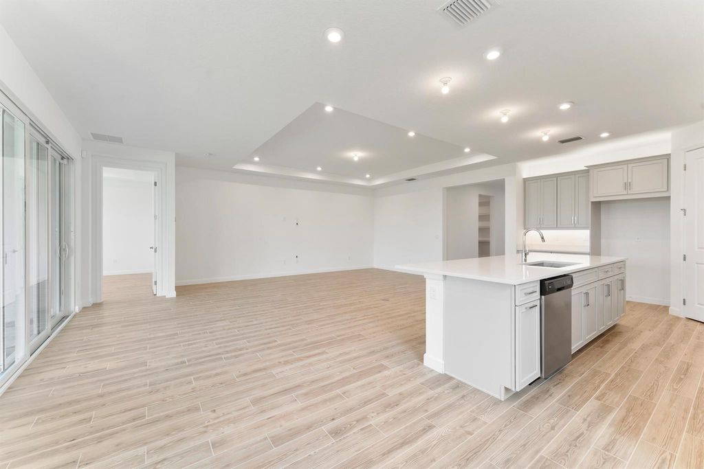 Photo of 9817 SW Isabelline Drive, Port Saint Lucie, FL 34987 (MLS # R10899419)