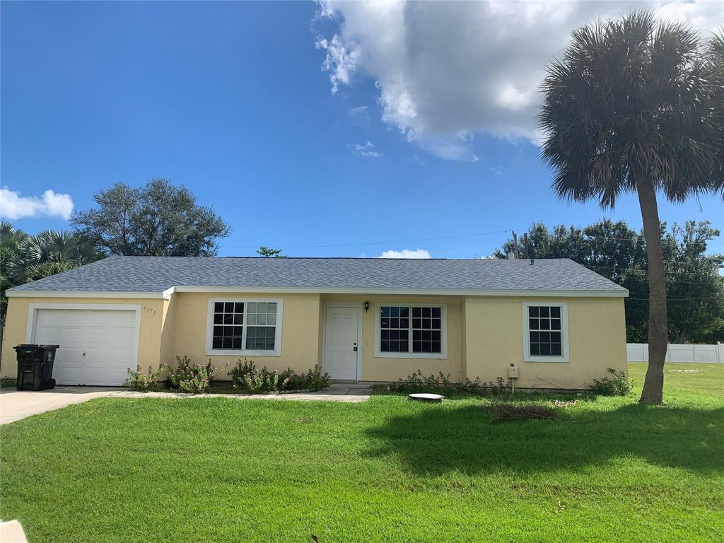 Photo of 2273 SE Merrill Road, Port Saint Lucie, FL 34952 (MLS # F10550111)