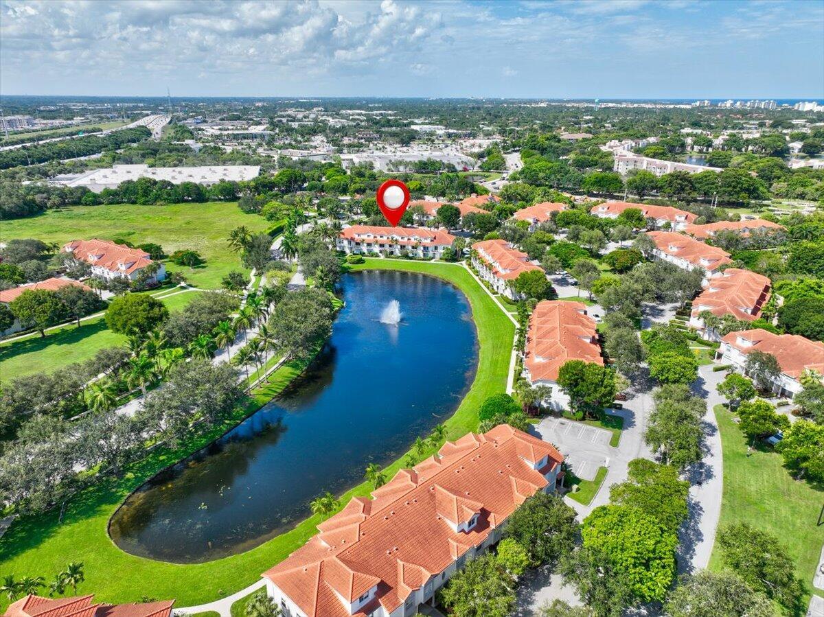 STUNNING LONG LAKE VIEWS - Rare opportunity in a sought-after award-winning gated East Delray community. This 3-story townhouse showcases sweeping lake views from both the living room & primary bedroom--sunrise and moonrise included. Tile flooring throughout, no carpet! Community upgrades include new roofs, resurfaced roads, lush landscaping, strong reserves - low HOA with no special assessments. Just a close walk to the resort-style pool, fitness center, clubhouse, tennis/pickleball, basketball, volleyball, walking/bike paths, playground, picnic gazebos, and resident car wash. Includes garage, driveway & guest parking. Pet-friendly & investor friendly--rent right away. Current tenant can stay or move out. Minutes to Whole Foods, Trader Joe's, Publix, dining, salons, Atlantic Ave, & Beach!