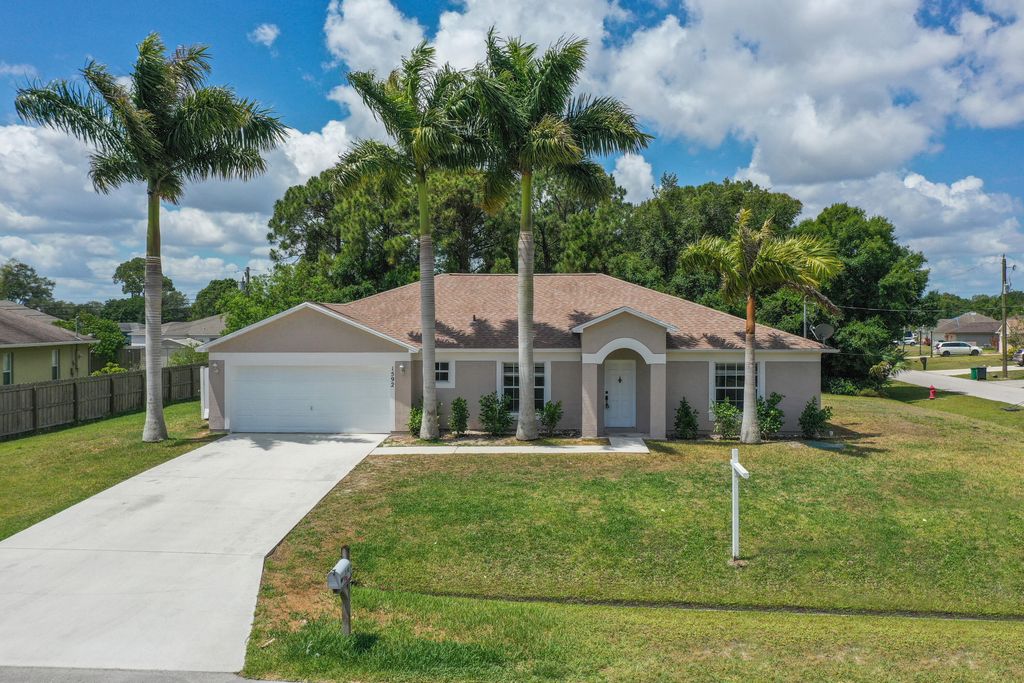 Photo of 1592 SW Dow Lane, Port Saint Lucie, FL 34953 (MLS # R10986880)