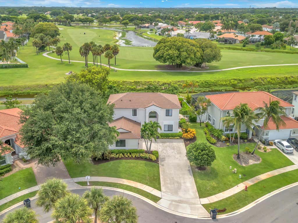 Photo of 6347 SHADOW TREE Lane, Lake Worth, FL 33463 (MLS # B26059110)