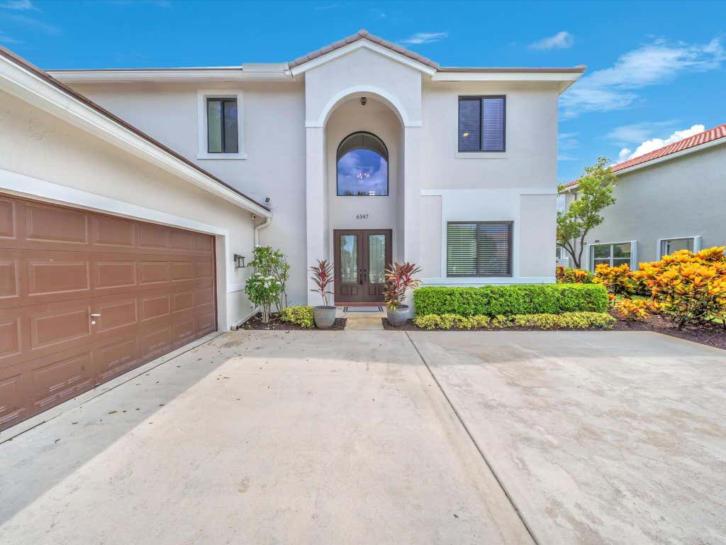 Photo of 6347 SHADOW TREE Lane, Lake Worth, FL 33463 (MLS # B26059110)