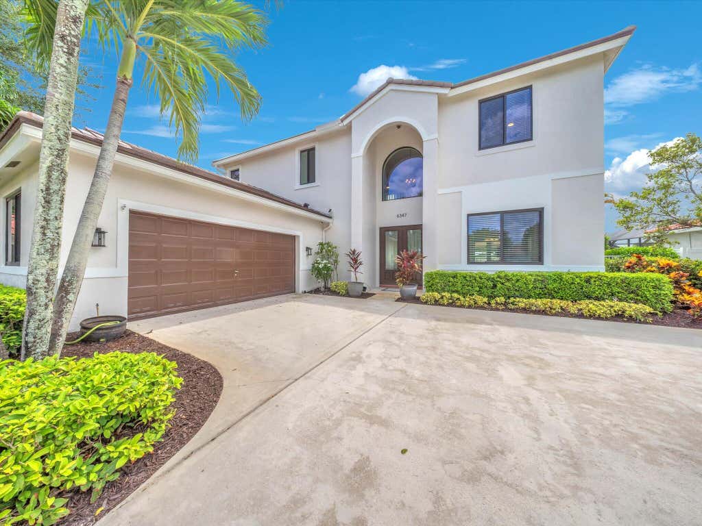 Photo of 6347 SHADOW TREE Lane, Lake Worth, FL 33463 (MLS # B26059110)