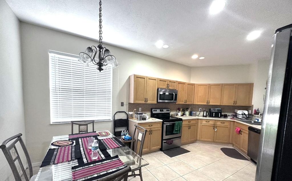 Photo of 840 SW Rocky Bayou Terrace, Port Saint Lucie, FL 34986 (MLS # R10934873)