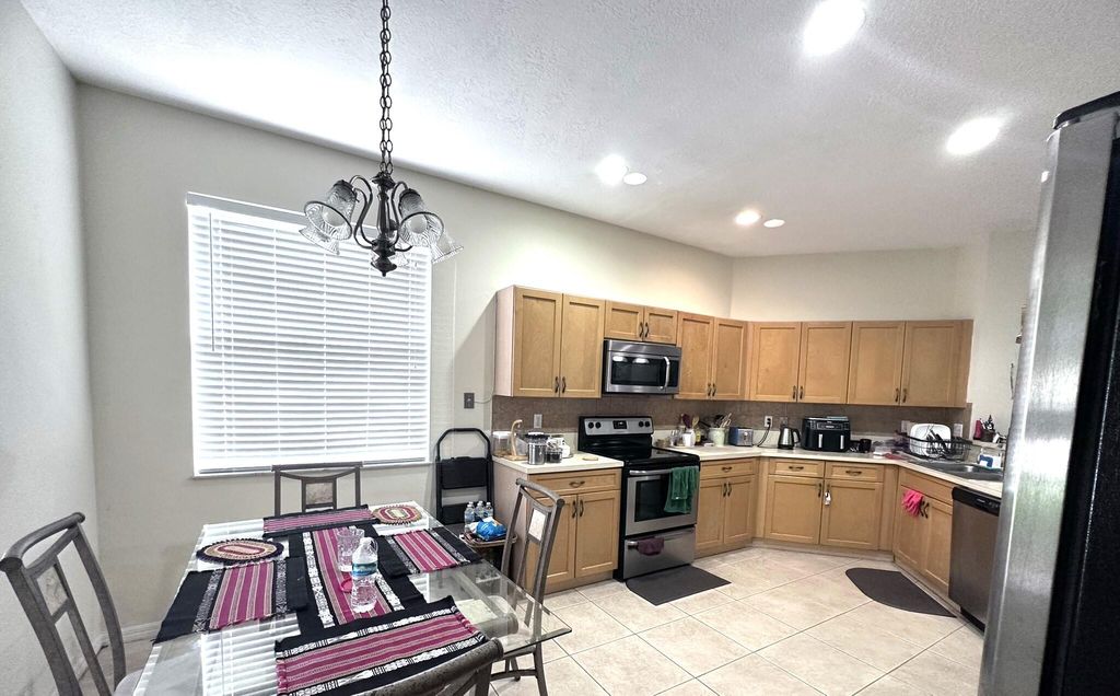 Photo of 840 SW Rocky Bayou Terrace, Port Saint Lucie, FL 34986 (MLS # R10934873)