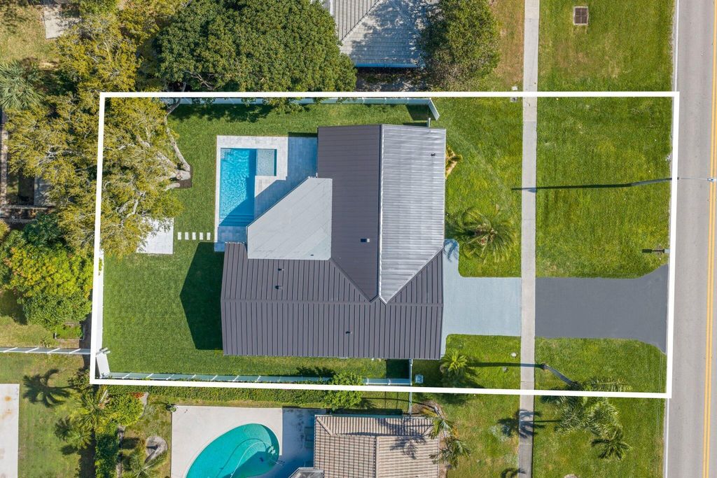 Photo of 979 NW 8th Street, Boca Raton, FL 33486 (MLS # B26020220)