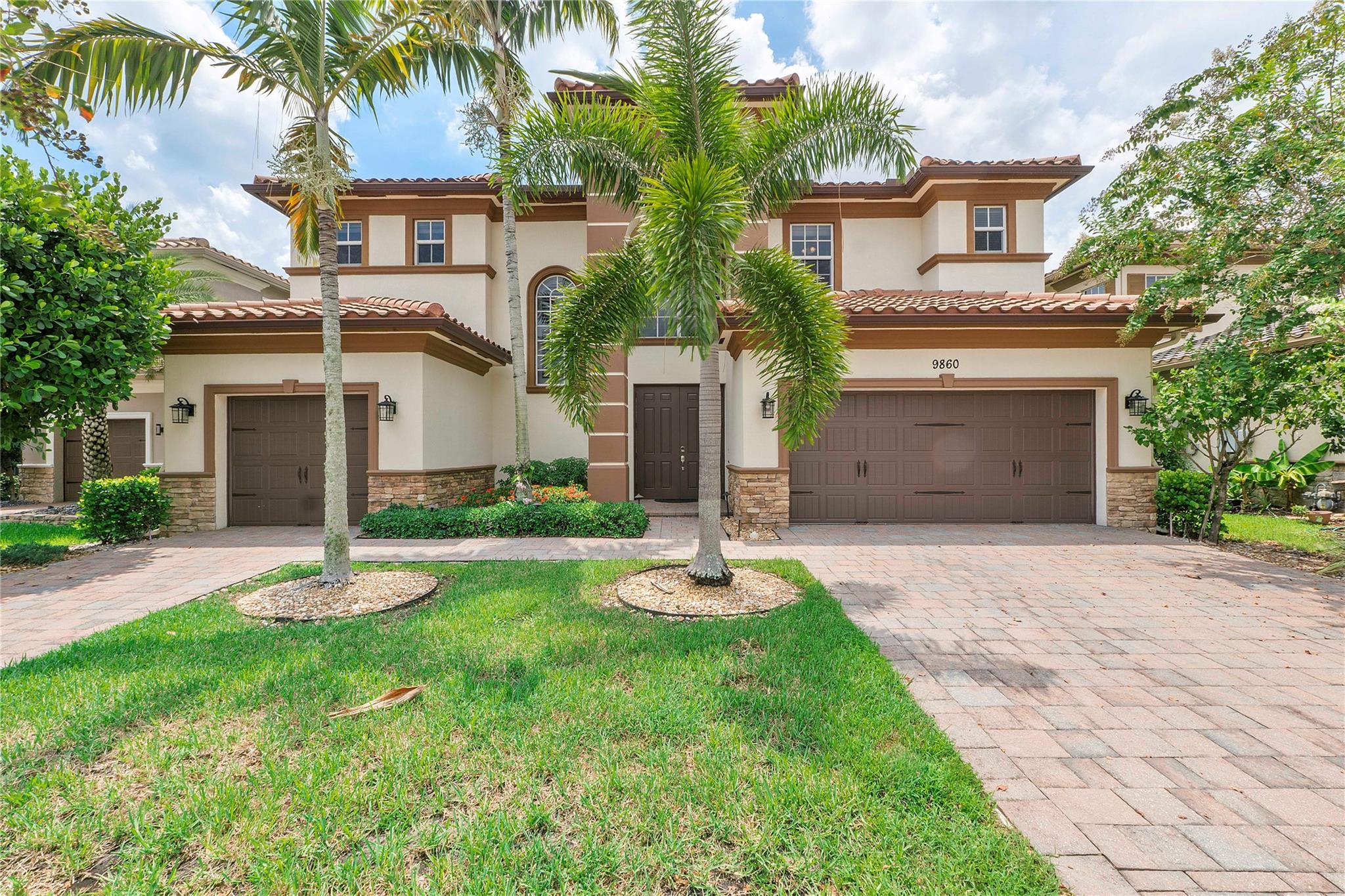 Stunning lake front home with breathtaking views in MiraLago at Parkland with gorgeous features and UPGRADES! This estate home features 6 bedrooms, 6.5 Baths, an office, and a spacious loft that could easily be converted into an additional bedroom. Magnificent kitchen with all stainless steel appliances, hardwood floors upstairs, wrought iron banister, plantation shutters, marble flooring downstairs, and a stylist brick wall with a fireplace. The spacious first floor primary suite boasts a luxurious spa retreat bathroom and extended walk-in closets. ALL INCLUSIVE AMENITIES include Olympic pools, Fitness Center, Splash Park, Indoor basketball, Playground and access to MiraLago & Cascata clubhouses. A-rated schools from Elementary to High School. Come experience the best of Parkland living.