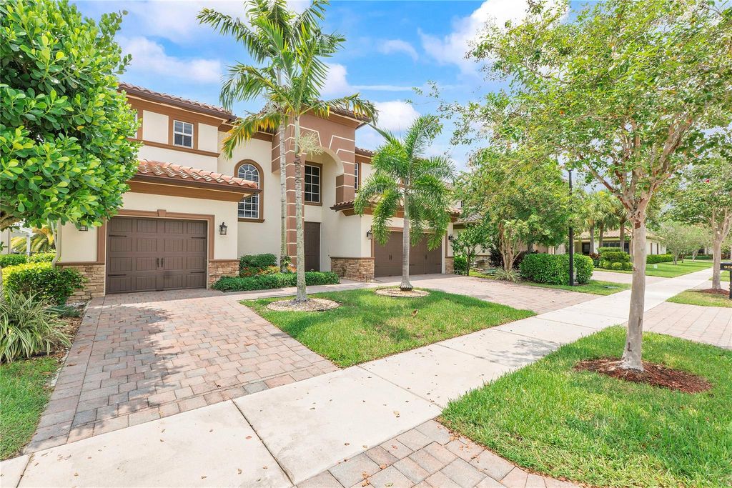 Photo of 9860 Lakeview Ln, Parkland, FL 33076 (MLS # F10524796)