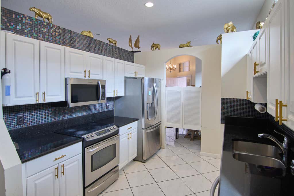 Photo of 2824 Waters Edge Circle, Greenacres, FL 33413 (MLS # F10545520)