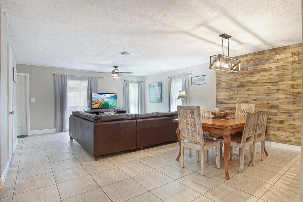 Photo of 1002 Avenue E E, Fort Pierce, FL 34950 (MLS # R11158446)