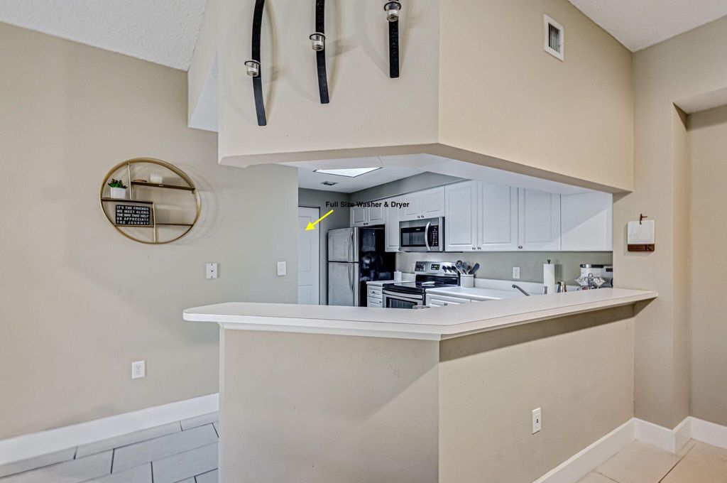 Photo of 3019 Alcazar Place #206, Palm Beach Gardens, FL 33410 (MLS # R11094619)