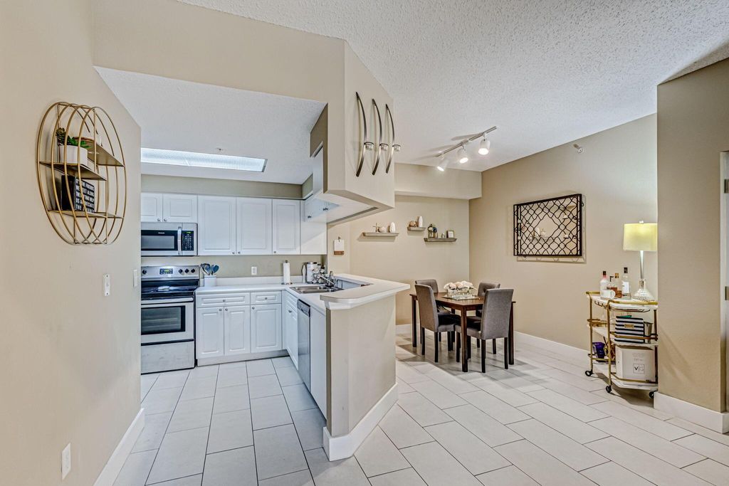 Photo of 3019 Alcazar Place #206, Palm Beach Gardens, FL 33410 (MLS # R11094619)