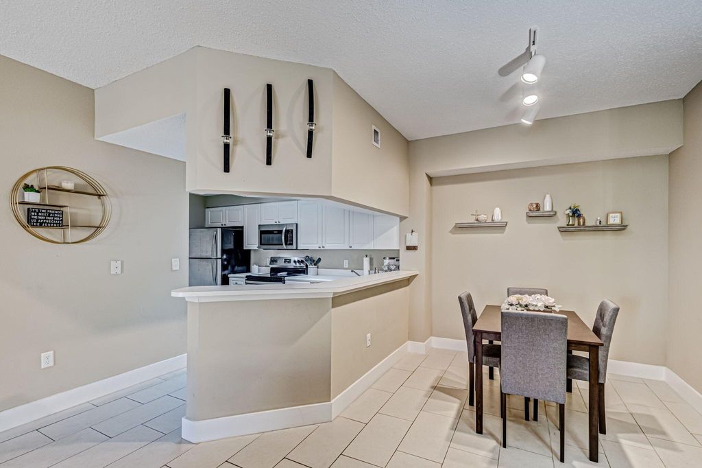 Photo of 3019 Alcazar Place #206, Palm Beach Gardens, FL 33410 (MLS # R11094619)