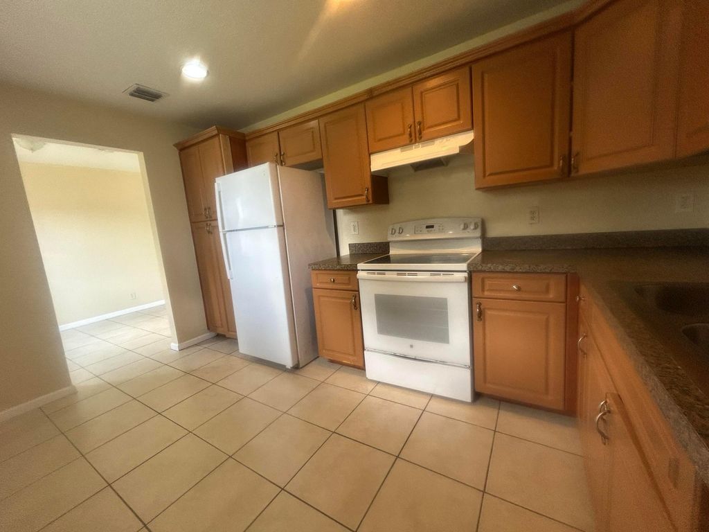 Photo of 1021 W 2nd Street #0, Riviera Beach, FL 33404 (MLS # B26040987)