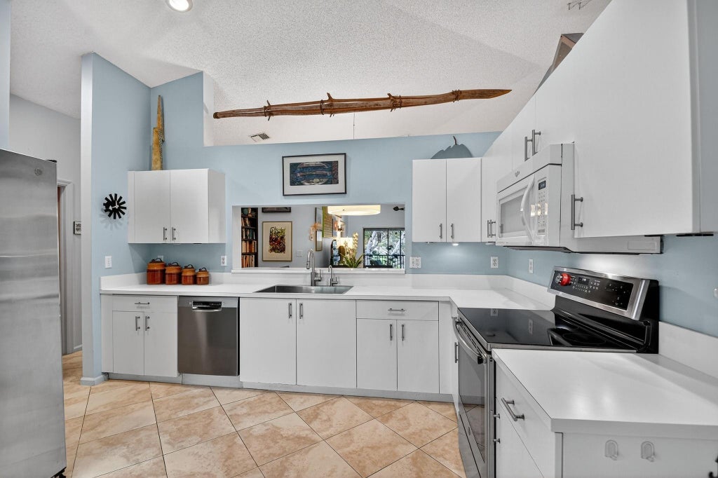 Photo of 9633 Sills Drive #201, Boynton Beach, FL 33437 (MLS # F10527642)