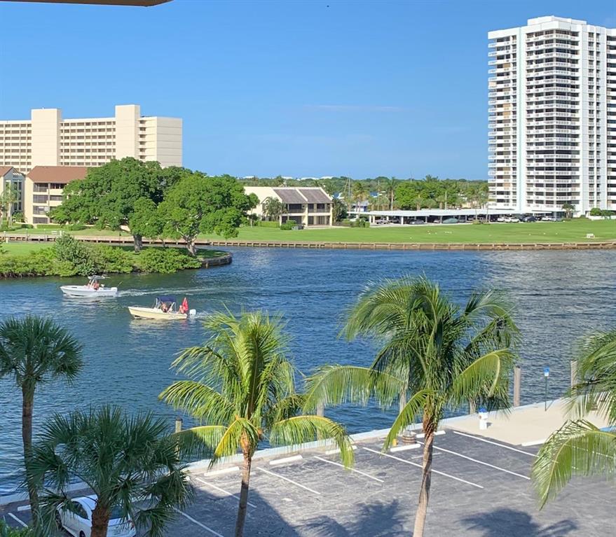 Inrracoastal & Marina views from screened and opne areas of lanai; 2Bedroom 2 bath; top floor - vaulted ceilings;walk-in closets; large kitchen with pass thru to LR/Dr.,cloths washer/ Dryer, covered parking; Accross from N Palm Beach Country Club (open to NPB residence) with upscale facilities including tennis, Nichlaus golf, olympic sized pool & dining.( water/sewer basic cable included)