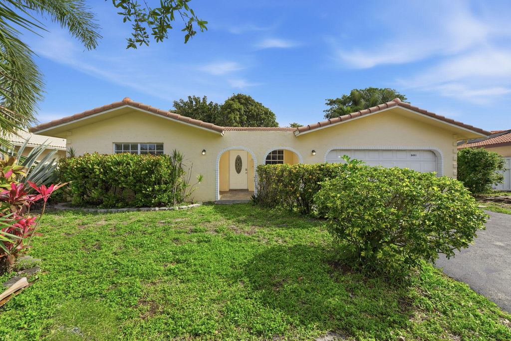 Photo of 8491 NW 26th Drive, Coral Springs, FL 33065 (MLS # B26016470)