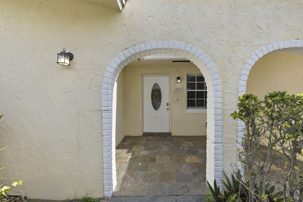 Photo of 8491 NW 26th Drive, Coral Springs, FL 33065 (MLS # B26016470)