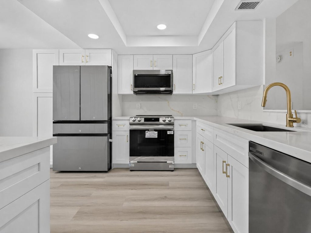 Photo of 7 WILLOWBROOK Lane #101, Delray Beach, FL 33446 (MLS # B26071945)