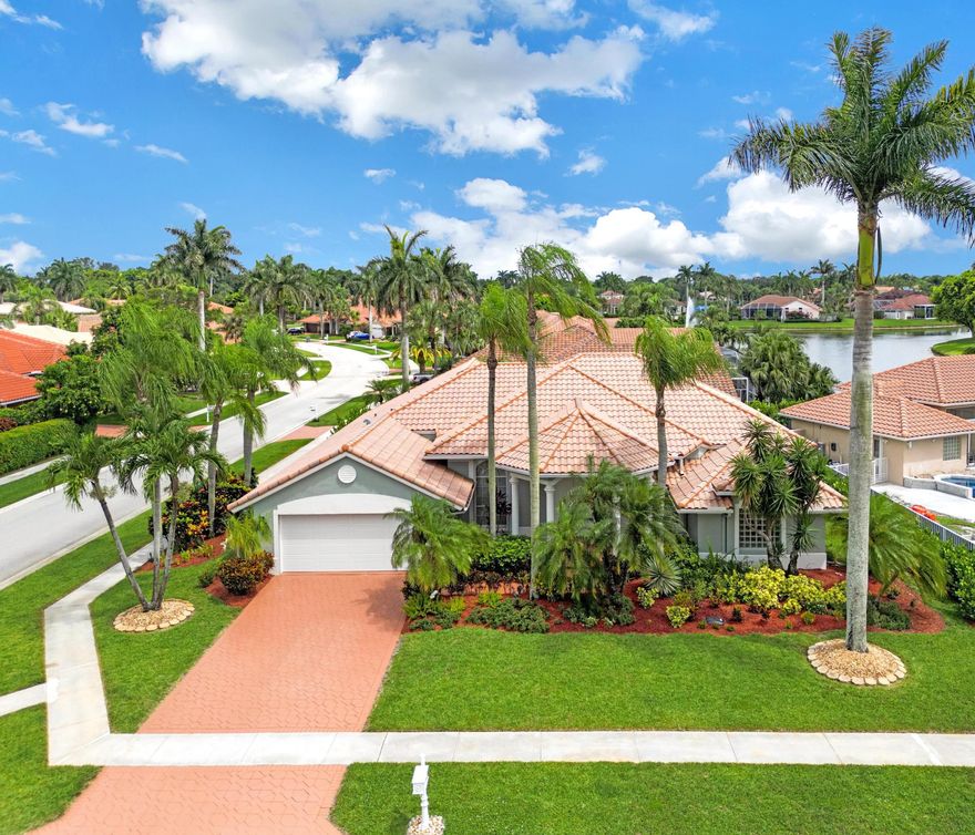 Gorgeous home on a corner lot in the highly desired community of Boca Isles North! This home has had recent extensive upgrades including the flooring, bathrooms, kitchen, newly painted interior & exterior. 2 new AC units in 2022 (12k), in ground full house generator 2022 (22k), new hurricane rated garage door 2022, new dishwasher, new backyard fence 2022  & updated landscaping. Roof 2008. This model is a 3 way split floorplan with an enormous kitchen that overlooks the family room & dining area & has newer appliances. The high ceilings and rear South exposure affords lots of natural light throughout the living areas. The community has a clubhouse, pool, tennis, pickleball, fitness room, billiards & is close to A rated schools