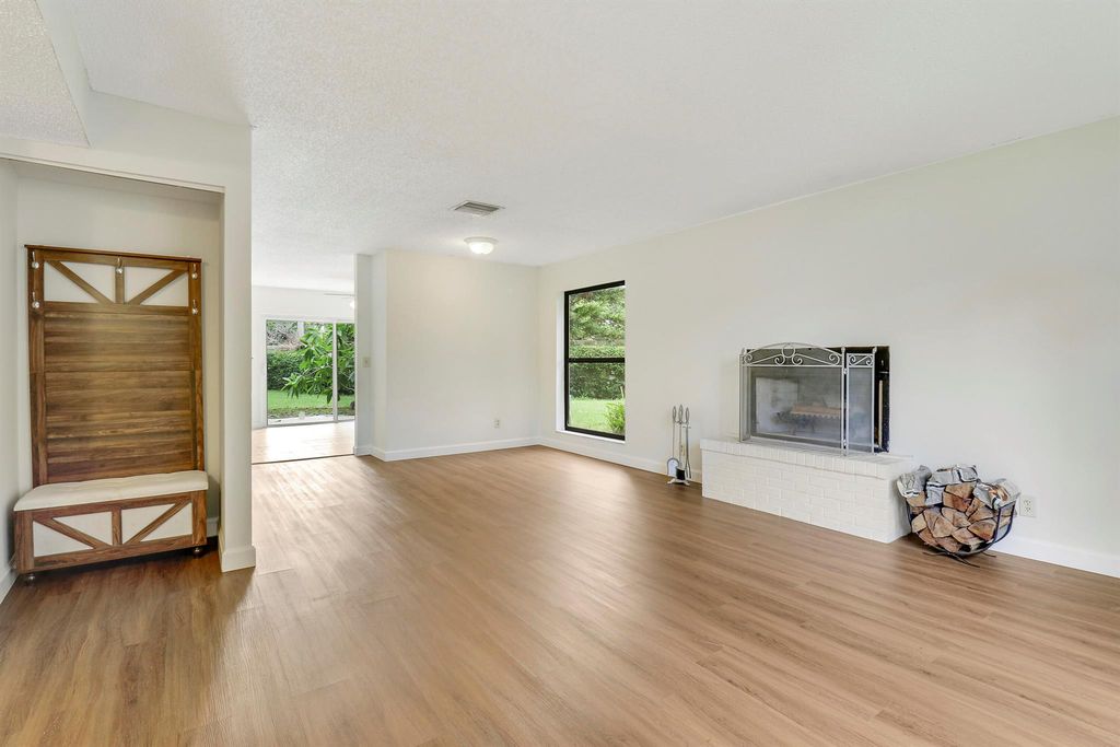 Photo of 313 Sandtree Drive, Palm Beach Gardens, FL 33403 (MLS # R11004159)